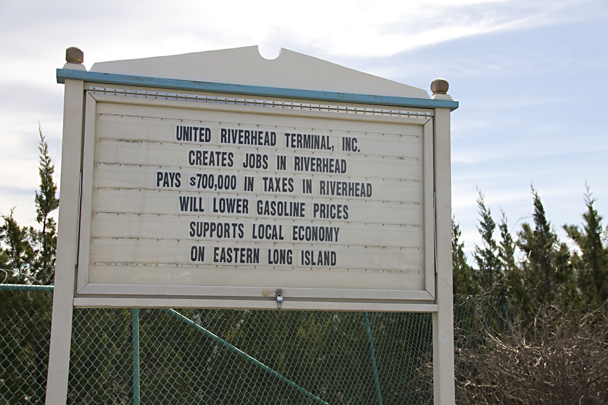 Who owns this sign?If you ask a local community group or a oil terminal, they'll both say they do. (Credit: Paul Squire)