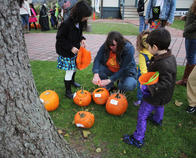 A crowd gathers for lighting of the Jack O’Lanterns.