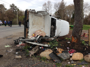 PAUL SQUIRE PHOTO | The wreckage of a pickup truck that was struck in a multi-car accident in Calverton Monday morning.