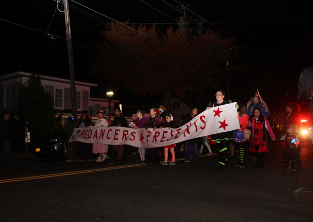Redancers marching with their banner to present Thriller.