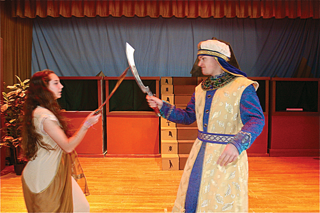 Kate Lewis of Wainscott as Nehebka in a swordfight with Zoser the King of Egypt, played by Ian Byrne of Baiting Hollow. (Credit: Barbaraellen Koch)