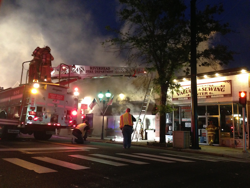 PAUL SQUIRE FILE PHOTO | Emergency crews responded to a fire at Athens Grill on East Main Street.