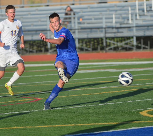Riverhead junior Phil Barabanov scores the game-winning goal in Monday's win over West Islip. (Credit: Robert O'Rourk)