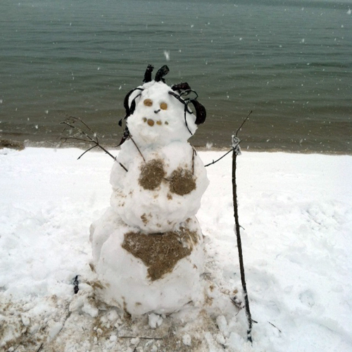 A beach snow woman created by Sophie, Victoria, and Anastasia Stapon in South Jamesport. (Sophie Stapon courtesy photo) 
