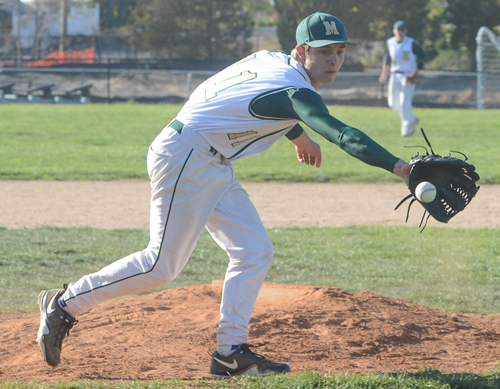ROBERT O'ROURK PHOTO | Bishop McGann-Mercy's starting pitcher, Kevin Thomas, came off the mound to handle a ground ball.