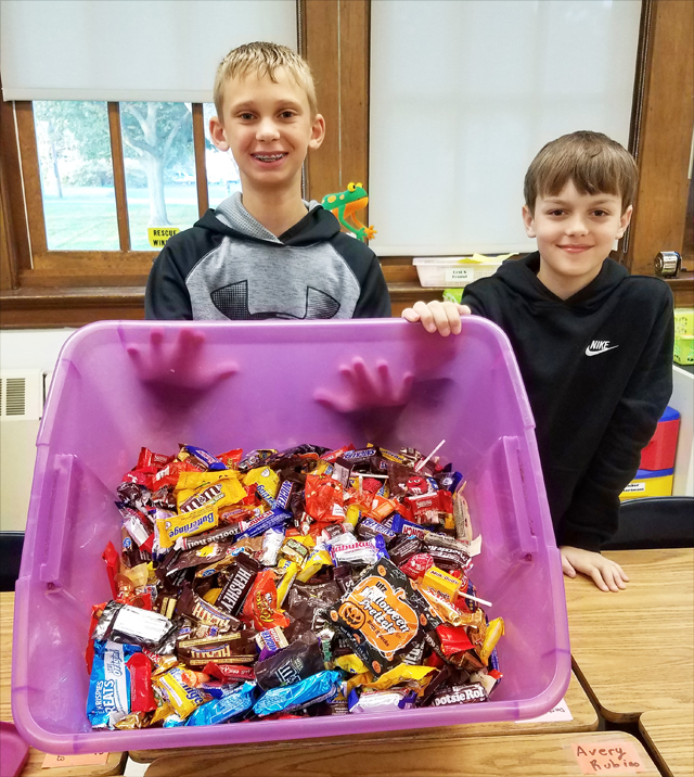 Ben Grodski, left, and James Gallo, collected about 40 pounds of candy. (Credit: Riverhead Schools)