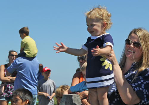 Julianna Elefonte cheers on as the ducks near the finish line last year. (Credit: Carrie Miller, file)