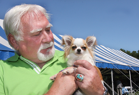 Shoshire Kennels co-owner Dwayne Early of Aquebogue and his two-year-old long-haired Chihuahua Lady Gaga last year. (Credit: Barbaraellen Koch, file)