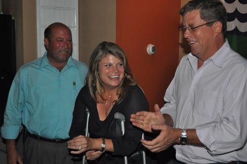 GRANT PARPAN PHOTO | Councilwoman Jodi Giglio celebrates her primary election win with fellow Town Board members James Wooten (left) and George Gabrielsen.