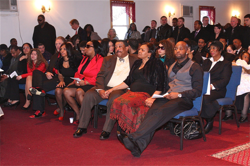 BARBARAELLEN KOCH PHOTO  |  Demitri Hampton's family in the front row: (from right) brother Jamal Davis, parents Juanita and Theodore 'Teddy' Trent, and sister Jennifer Davis.