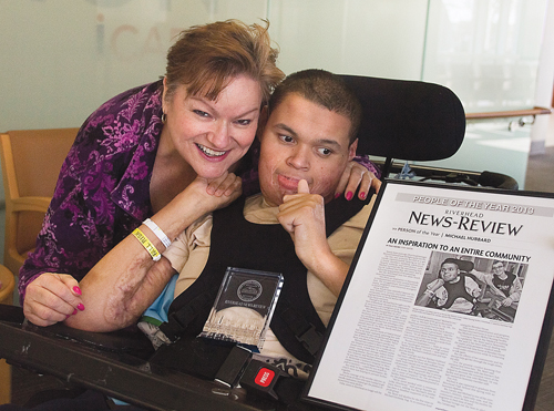 Nancy Reyer and her son Michael Hubbard with 2013 'Person of the Year' award. (Credit: Barbaraellen Koch file)