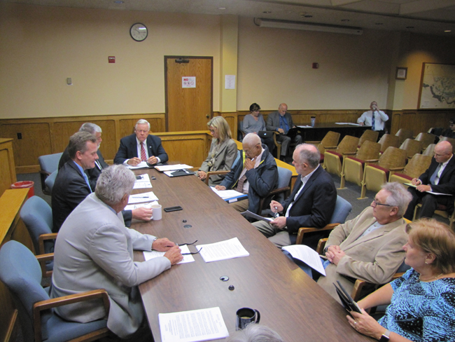 Riverhead's Independent Audit Committee members discuss a building department audit with Town Board members Thursday. 