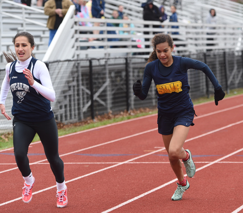 Shoreham-Wading River eighth-grader Katharine Lee races toward the finish line in the 400-meter race. (Credit: Robert O'Rourk)