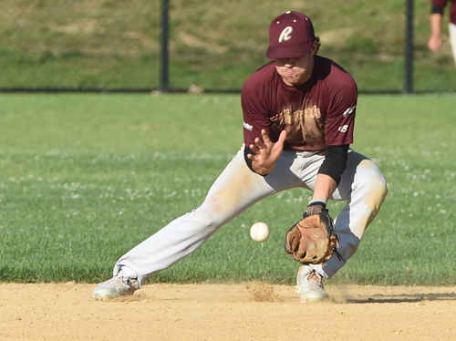 Riverhead Tomcats shortstop Danny Mendick fields a grounder in Game 2 of a doubleheader against Southampton Thursday. Mendick drove in six runs in the two games. (Credit: Robert O'Rourk)