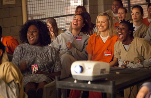 NETFLIX COURTESY PHOTO | Taylor Schilling, center, and castmates in a scene from season one of 'Orange is the New Black.' 