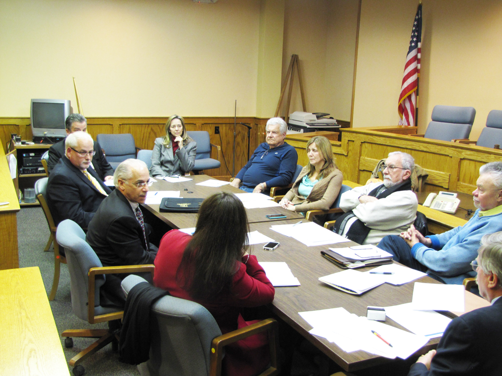 Peconic Bay Medical Center representatives meeting with Riverhead IDA officials in March. (Credit: Tim Gannon)