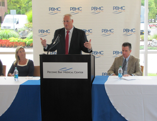 TIM GANNON PHOTO | PMBC Health president and CEO Andrew Mitchell announces the health group's new brand name at a press event Wednesday at Peconic Bay Medical Center hospital in Riverhead.