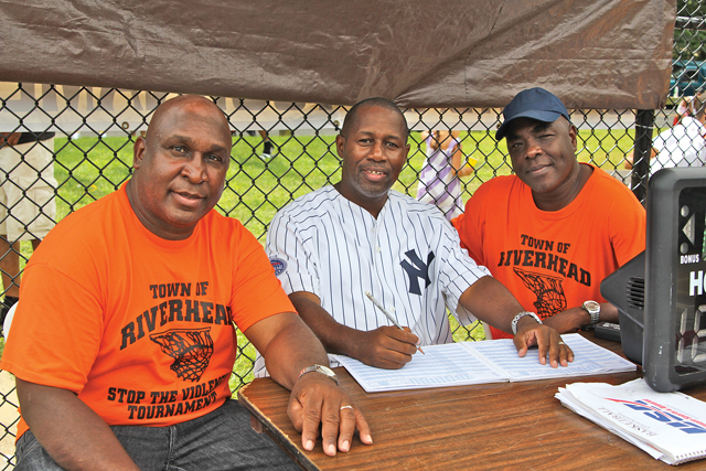 Dwayne Eleazer (left) and Larry Williams (right) at the Stop the Violence basketball tournament in August 2011. (Credit: Jen Nuzzo, file)
