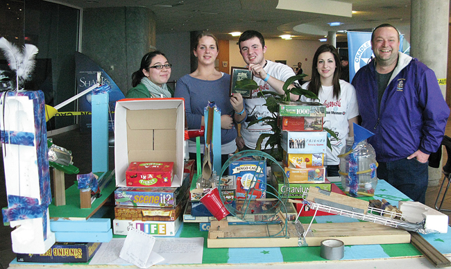 Riverhead High School science teacher Greg Wallace (far right) with his students at the 2011 Rube Goldberg competition. (Credit: Suzanne Hulme)