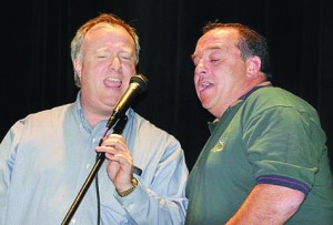 Doug Wald (left), who founded the Sing East End Karaoke night, is joined by friend Mark Stark in a tune at last year's inaugural event at Vail-Leavitt Music  Hall. This year's event, a fundraiser for East End Hospice, is scheduled for Saturday, March 12.