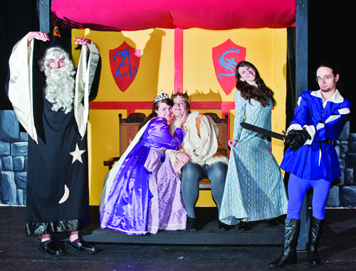 The Riverhead High School Blue Masques will present 'Once Upon a Mattress,' the musical retelling of 'The Princess and the Pea,' this weekend and next at the high school auditorium. Performances are at 8 p.m. Saturdays, April 2 and 9, and Friday, April 8, and at 2 p.m. Sunday, April 3. From left: Dan Raynor as the wizard, Elizabeth Wells as Queen Aggravain, Michael Drozd as Prince Dauntless, Hannah Keiffert as Lady Larken and Stephen Peppaceno as Sir Harry.