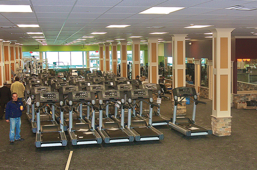 Maximus Health & Fitness is expected to open within the next couple of weeks in the former Woolworth building on East Main Street. Pictured is the 25,000-square-foot main exercise room. (Credit: Barbaraellen Koch)