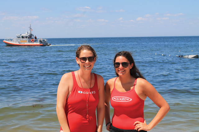 Riverhead lifeguards save three after boat capsizes at Reeves