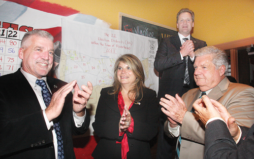 BARBARAELLEN KOCH FILE PHOTO  |  Riverhead Republicans celebrate their victorious sweep Election night in downtown Riverhead. From left: committee chairman Mason Haas, Councilwoman Jodi Giglio, Supervisor Sean Walter and Councilman John Dunleavy.