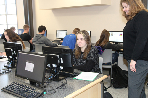 Students researching Shakespearean sonnets in a new computer lab.