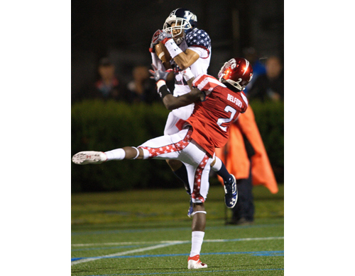 GARRET MEADE PHOTO | Jeff Pittman of Riverhead coming down with an interception for Long Island late in the second quarter.