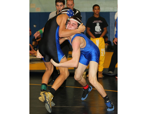 DANIEL DE MATO PHOTO | Ed Matyka of Riverhead, right, pinned North Babylon's Dav Meile-Estrella at 2 minutes 16 seconds of the 113-pound final for his second North Fork Invitational title in three years.