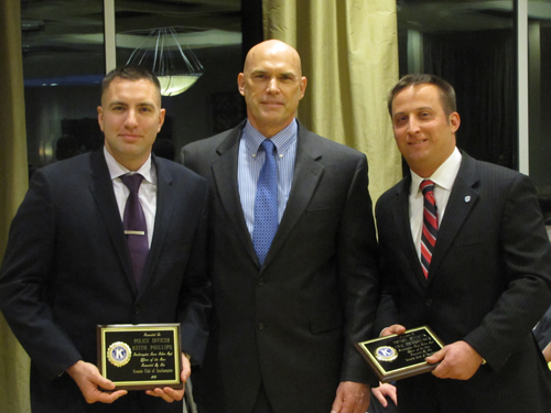 Southampton Town Officer Keith Phillips, left, Captain Larry Schurek, and Officer Eric Breitwieser at Friday's Police Awards ceremony in Riverhead
