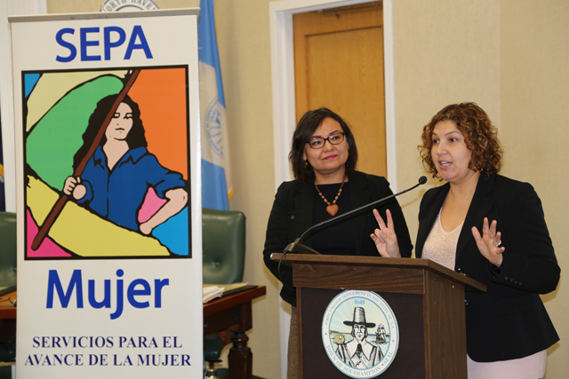 Siris Barrios of Riverside Rediscovered speaks next to SEPA Mujer director Martha Maffei. (Credit: Joe Werkmeister)