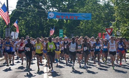GARRET MEADE PHOTO | Runners hit the course at the start of the 34th annual Shelter Island 10K Run.