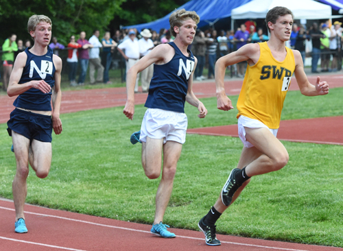 Shoreham-Wading River's Ryan Udvadia passed Northport's brothers on the last lap before coming in first place in the 3,200 meters. (Credit: Robert O'Rourk)