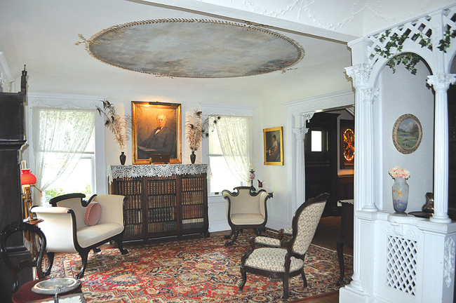 The Thomas Moore House, built around 1750 and named for the original owner of the land, is one of the historical society's oldest properties. The cape-style house has been fully restored to reflect life in the 18th century and features an original stove, pictured here. A room at the back of the house that functioned as a kitchen in the 1800s now contains a large loom used to exhibit examples of early weaving. (Credit: Rachel Young)