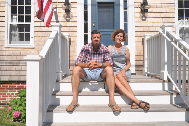Michael and Alison Ventura outside their historic Village Lane home in Orient. The Cape Cod dates back to the 1700s. (Credit: Grant Parpan)