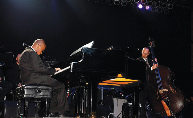 Brandon Boardman (at piano) and his teacher, Billy Johnson, perform at the Long Island Music Hall of Fame Gala on Oct. 23. Mr. Boardman, a Riverhead resident who has Asperger's syndrome, received a standing ovation following the performance. (Credit: Long Island Music Hall of Fame photos)