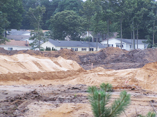 TIM GANNON FILE PHOTO | Excavation at the site of a future Costco on Route 58.