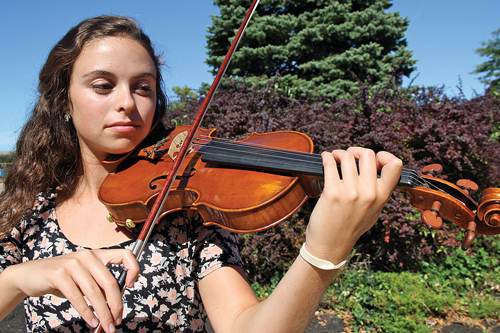 Amy Methven, a senior at RHS, was one of 100 high school students selected nationwide to perform in a prestigious orchestra next month in Nashville. (Credit: Carrie Miller)
