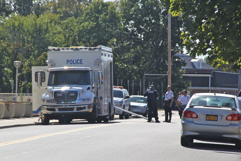 Update: 'Suspicious package' turns out to be briefcase - Riverhead News ...