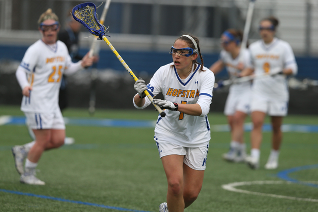 Riverhead graduate Carolyn Carrera finds herself in a new role on the lacrosse field as a player on Hofstra's team. (Credit: Zack Lane/Hofstra University)