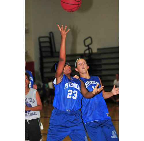 Riverhead freshman Faith Johnson-DeSilvia goes up for a basket Monday against Central Islip. (Credit: Bill Landon)