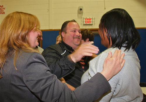 Superintendent Nancy Carney (left) and school board members Gregory Meyer and Kimberly Ligon after learning they were re-elected Tuesday. (Credit: Barbaraellen Koch)