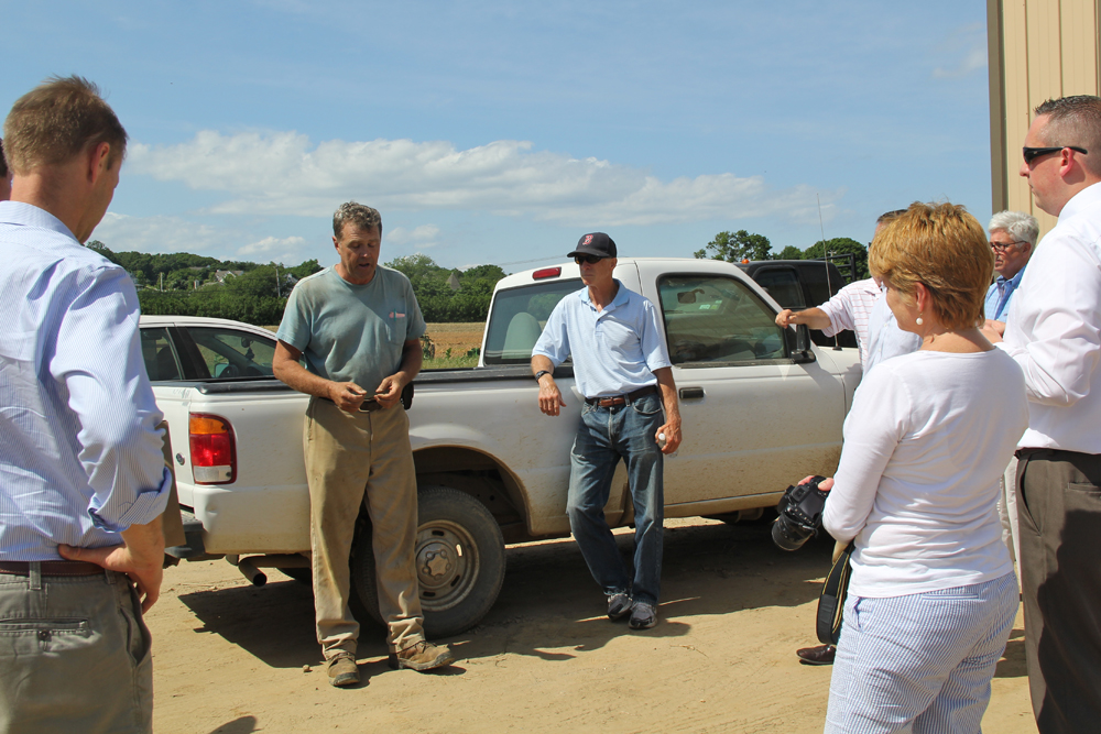 Phil Schmitt speaking with industry officials from upstate Wednesday afternoon. (Credit: Carrie Miller)