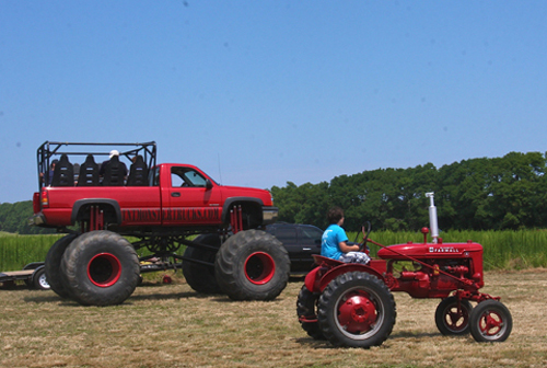 BARBARAELLEN KOCH PHOTO | A 2004 Chevy Silverado Monster truck owned by Leo Terrizzi of Bohemia was giving rides around the museum farm for $5.