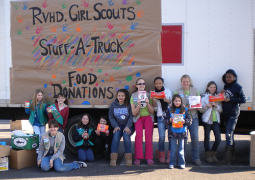 Riverhead Girl Scouts held a 'Stuff a Truck' food drive on March 19. Riverhead Building Supply offered the use of the truck, and scouts collected nonperishable items outside Waldbaum's, King Kullen, Stop & Shop and Walmart. Six local food pantries were the beneficiaries of the drive.