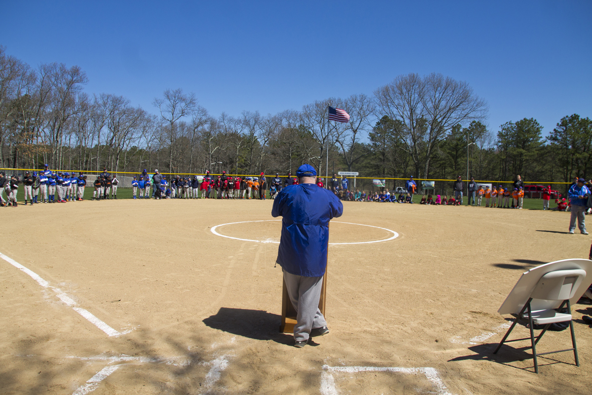 Little League president Tony Sammartano addresses the teams during his last Opening Day. (Credit: Paul Squire)