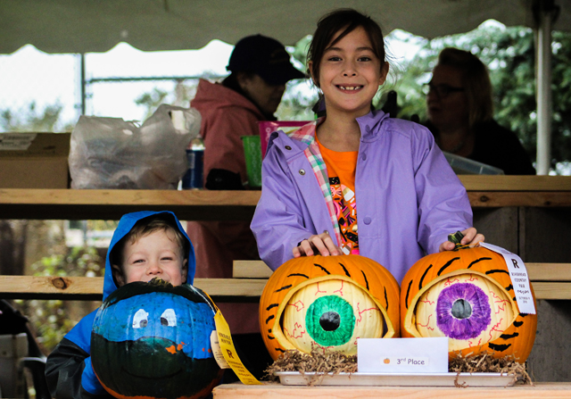 Jacob Lawrence (left) received honorable mention and sister Joslyn Lawrence placed third in the pumpkin decorating contest.