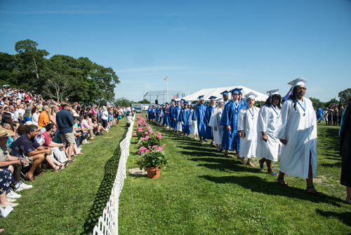 The graduates make their way to the ceremony. (Credit: Robert O'Rourk)